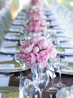 Stick with pink flowers Roses peonies and ranunculus are a few of my 